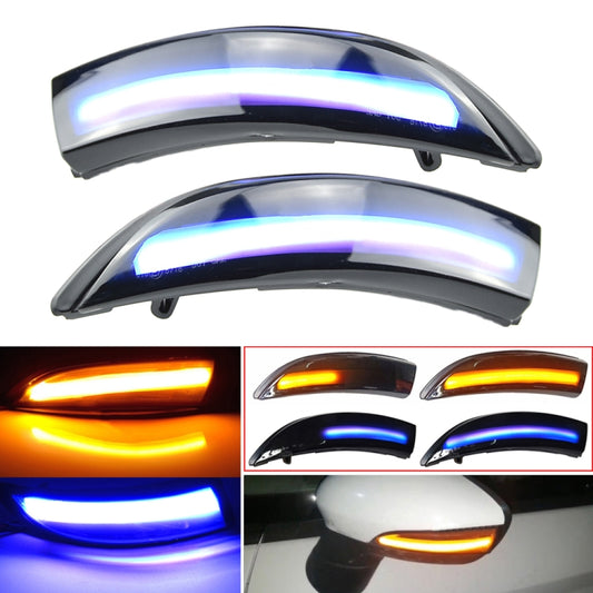 Pair of dynamic LED mirror turn signal strips with blue light glow, black housing.