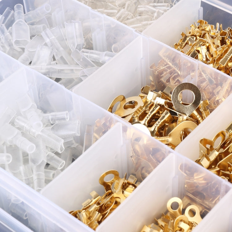 Assorted cable spade plug connectors in compartments, gold terminals and clear insulators