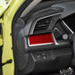 Red carbon-fiber patterned sticker on left central console trim panel