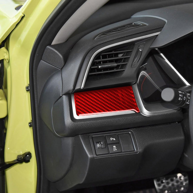 Red carbon-fiber patterned sticker on left central console trim panel
