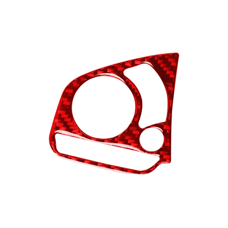 Red carbon-fiber steering wheel button trim frame with circular cutouts and small button hole