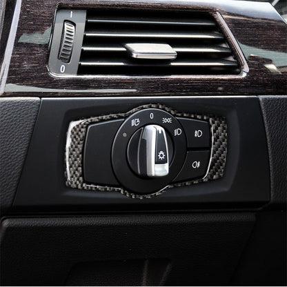 Carbon fiber headlight switch trim sticker, installed around the control knob on dashboard