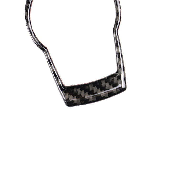 Carbon fiber patterned trim piece with curved edges for headlight switch control