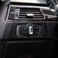 Carbon fiber headlight switch trim sticker installed, surrounding the rotary headlight control