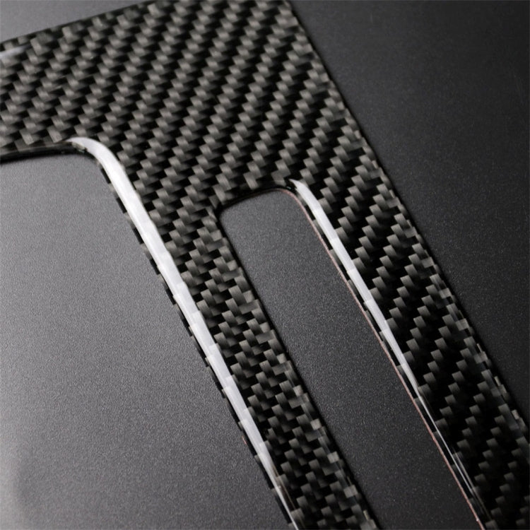 Carbon-fiber trim insert with vertical strip and rounded control cutout