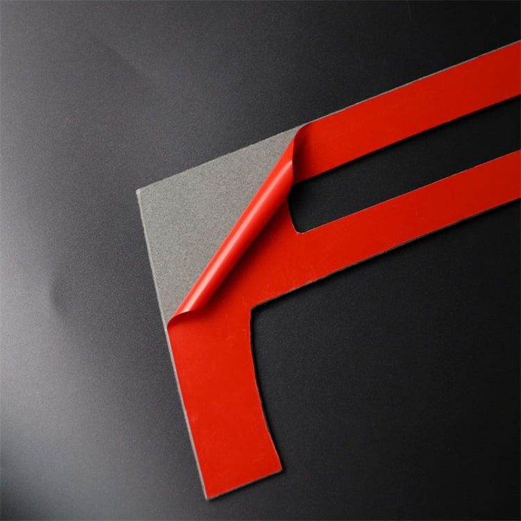Carbon-fiber CD panel trim with peel-off backing film and curved edge cutout