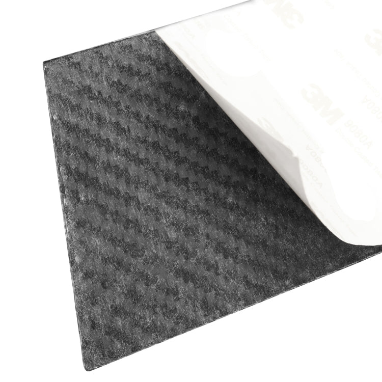 Curved black carbon fiber trim sticker with textured surface