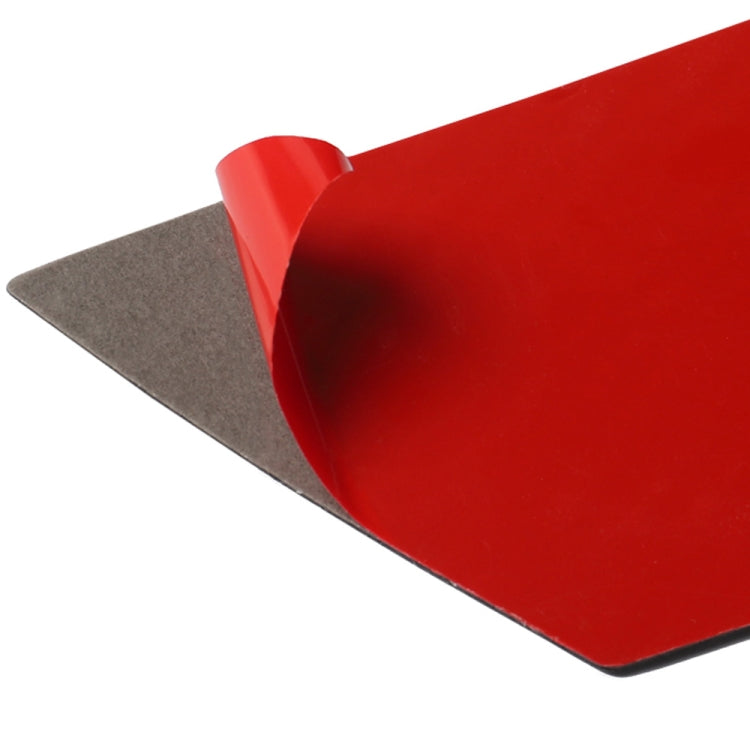 Carbon fiber rear window trim piece with red protective film, dark woven surface