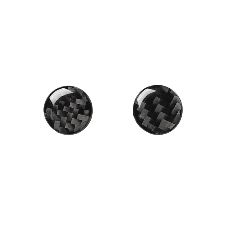 Two round carbon-fiber air conditioner knob stickers, black checker pattern
