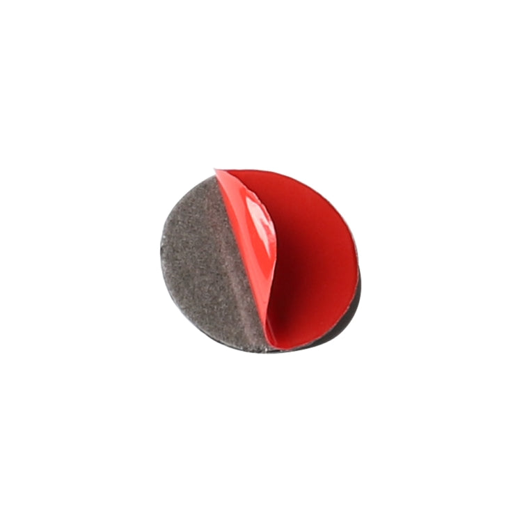 Carbon-fiber air conditioner knob sticker shown with red adhesive backing