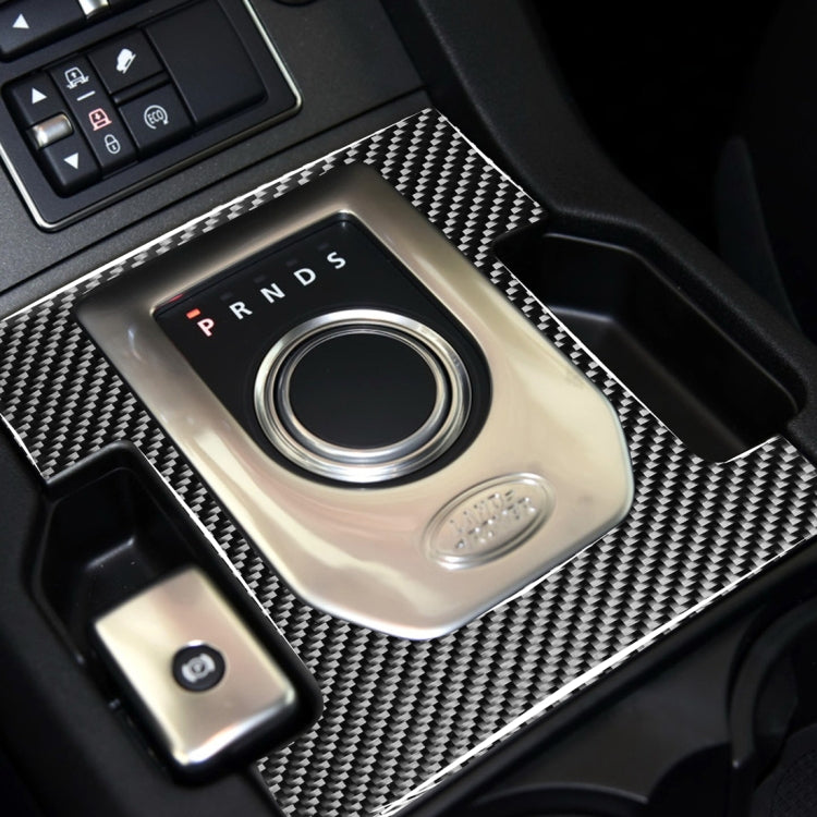 Installed carbon fiber gearshift panel sticker with PRND ring and button cutouts