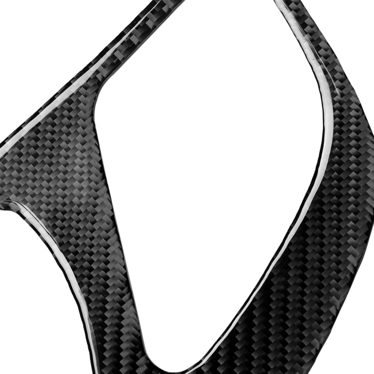 Black carbon fiber dashboard frame decorative sticker close-up texture
