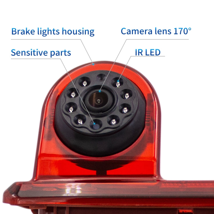 Front view of red camera lens module with IR LED and brake light housing details.