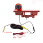 Red rearview camera kit with AV cables, yellow RCA and black power connector.