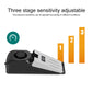 Black wedge door stop alarm with three sensitivity setting markers on the dial
