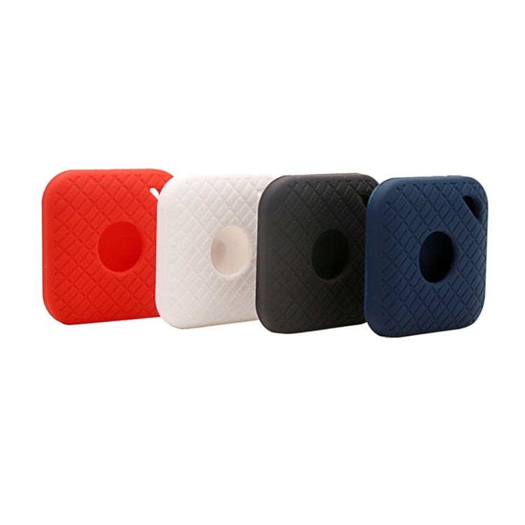 Set of silicone smart tracker cases in red, white, black, and blue with textured pattern