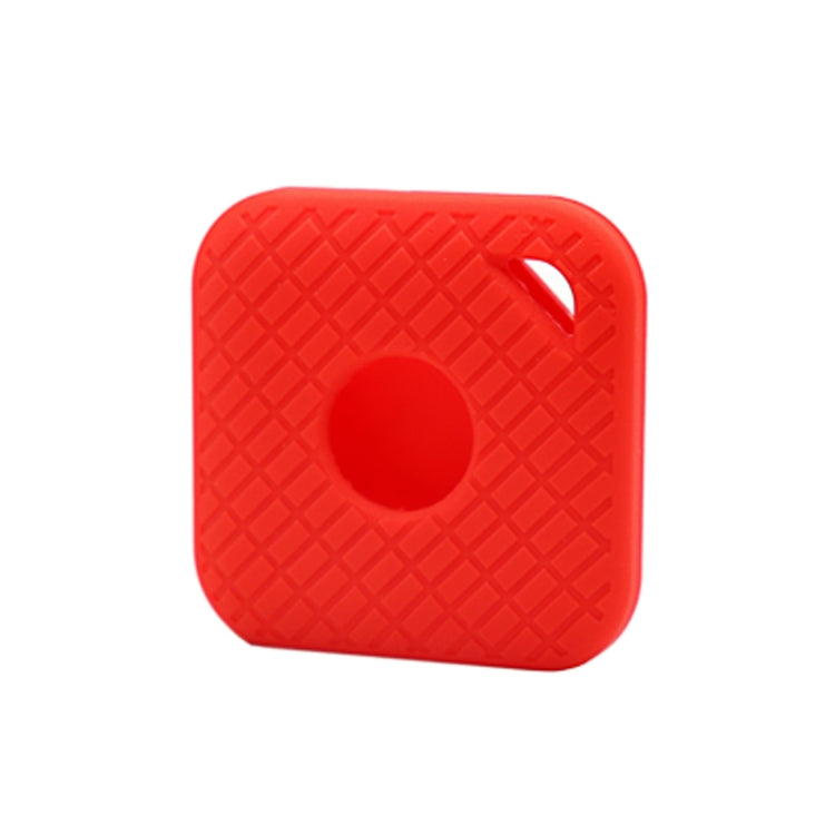 Red silicone smart tracker case with textured pattern and round opening