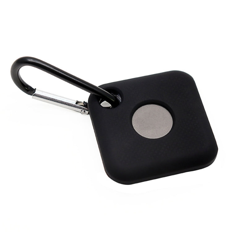 Black silicone tracker case with metal keyring clip and circular opening