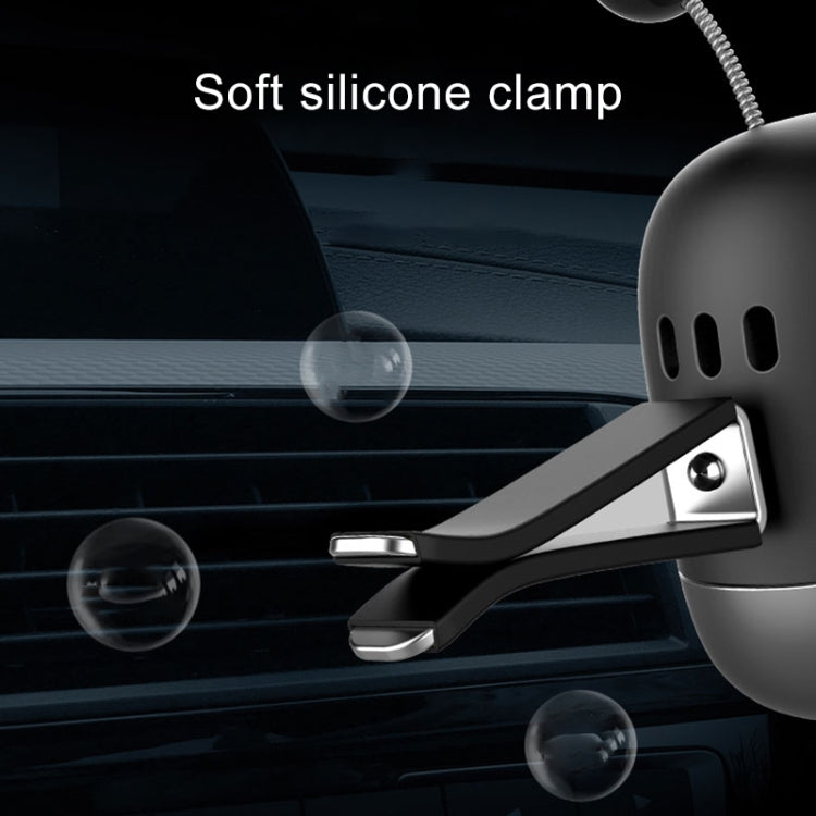 Black robot car air outlet aromatherapy clamp attachment on car air vent