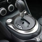 Installed carbon fiber trim sticker around gear shifter on car center console