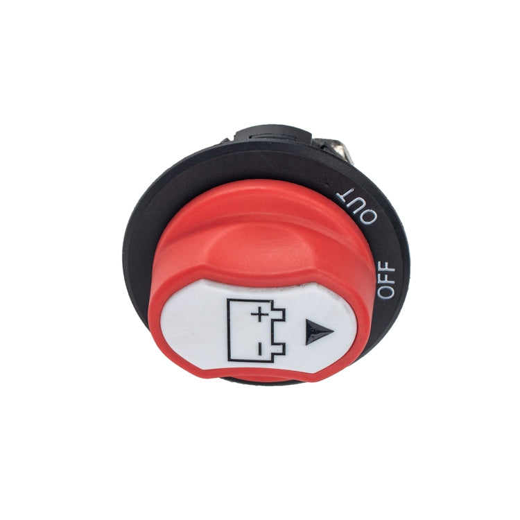Car battery switch with red cap, black ring, and battery polarity symbols + and -