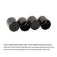 Set of four black docking point cover caps with rounded tops and open ends