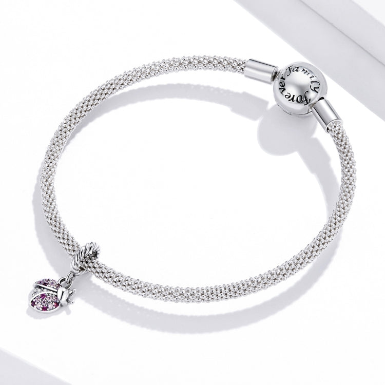 Rhinestone silver bracelet with oxidized ladybug pendant charm at one end