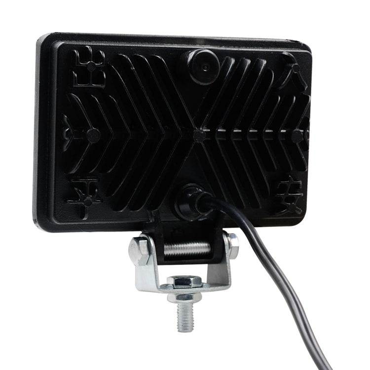 Backside of square LED work light with black heat sink, mounting plate and power wire