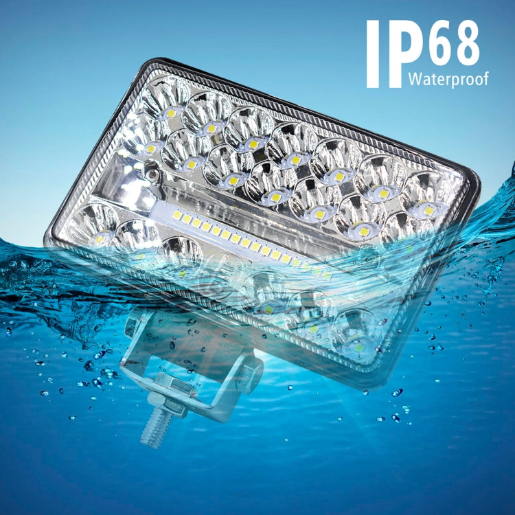 Square LED work light with chrome reflector and LED array, shown underwater