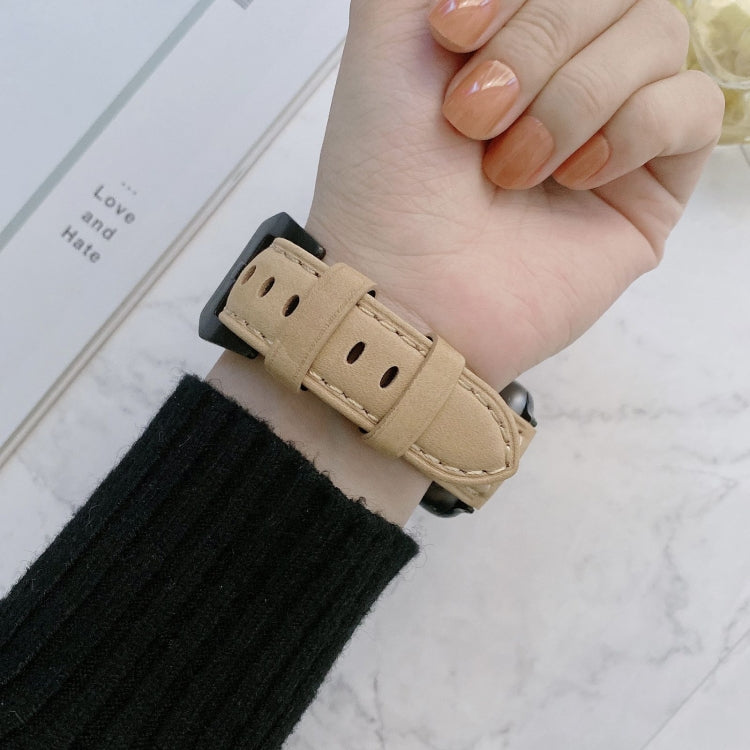 Beige leather buckle replacement watch band with pin buckle on a wrist