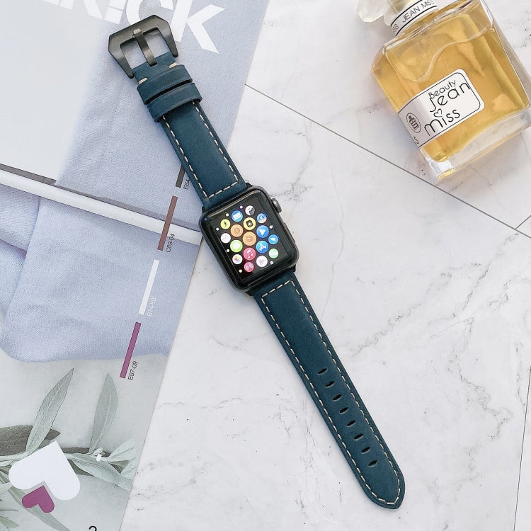 Blue leather buckle replacement watch band with perforated strap and metal clasp