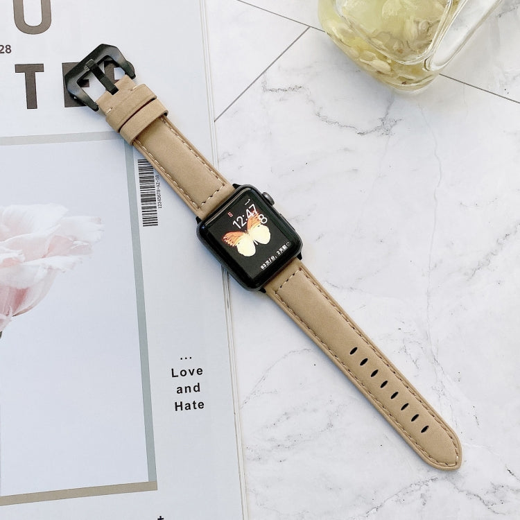 Beige leather watch band with buckle and perforated strap for a smartwatch