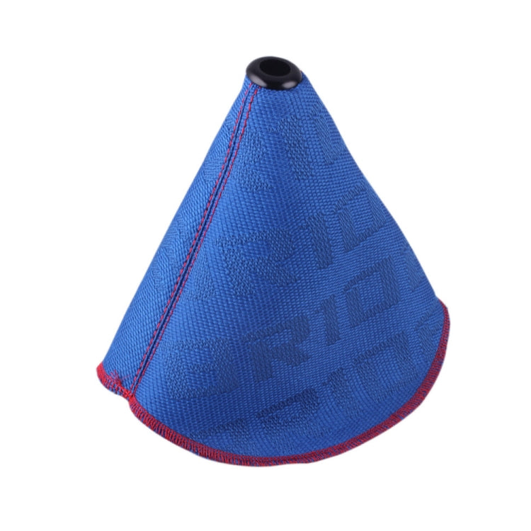Blue patterned shift knob dust cover with red edge stitching and round top opening