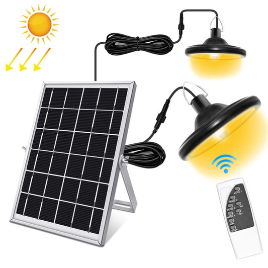 Solar LED induction light set with solar panel and black lamps on warm yellow light