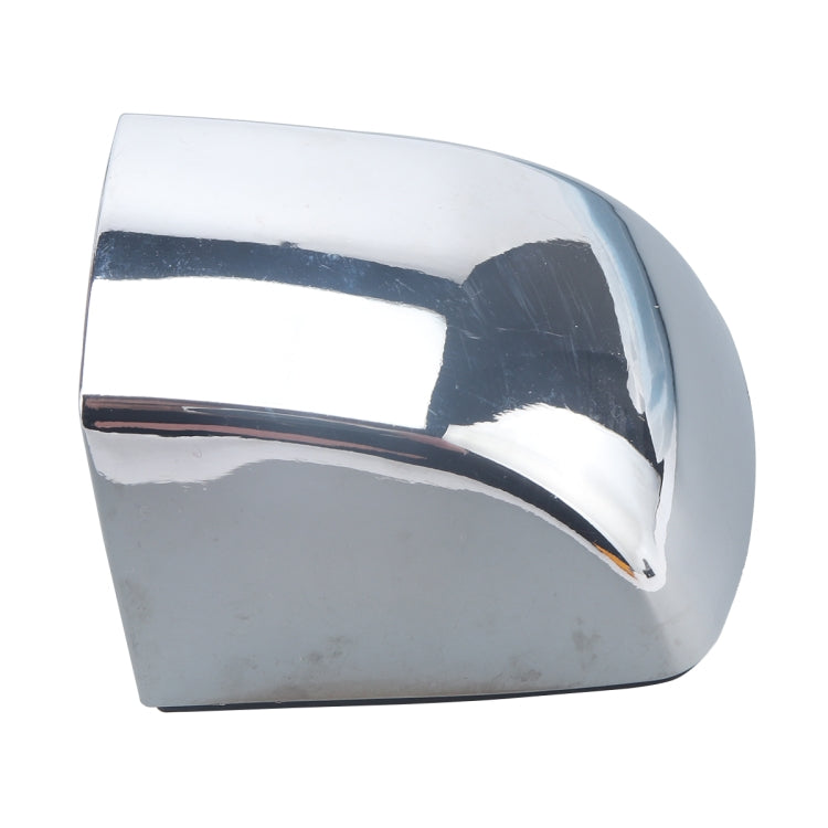 Exterior chrome door handle cover panel with glossy reflective surface