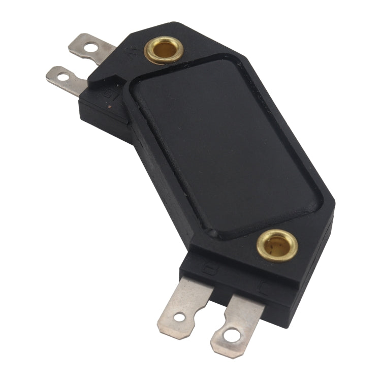 Black ignition control module with brass pins and angled metal mounting tabs