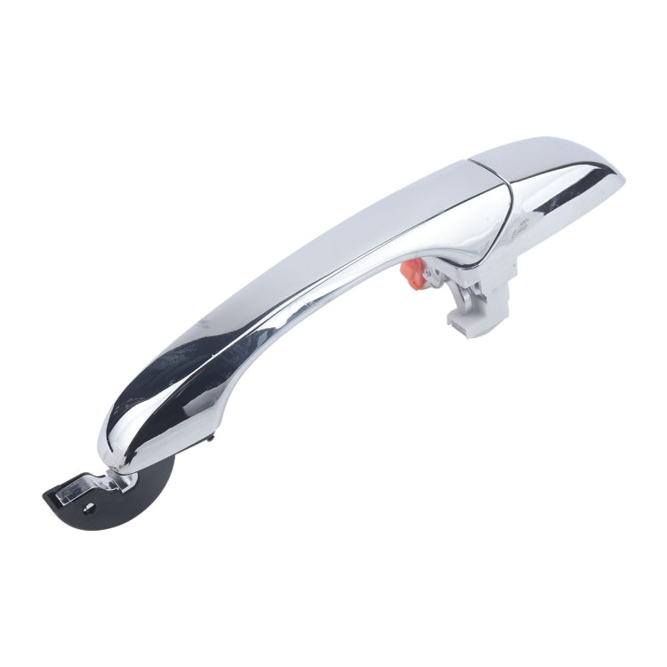 Chrome rear left exterior door handle with curved shape and mounting clip