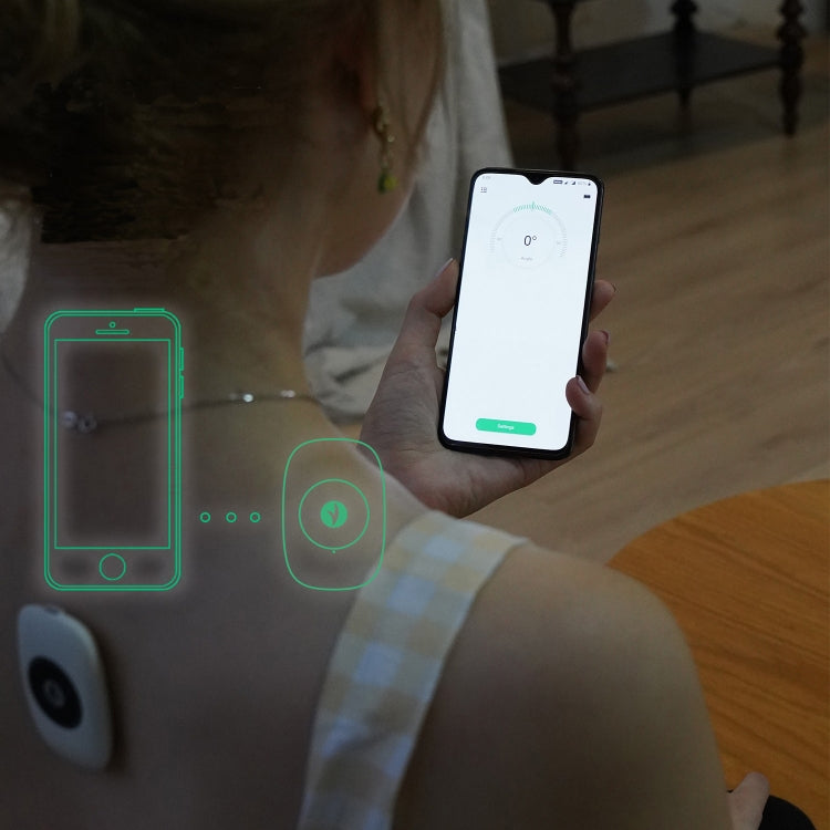 Posture sensor worn on clothing while holding a smartphone with posture reading
