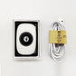 White posture sensor device with black icon, plus USB cable in retail box