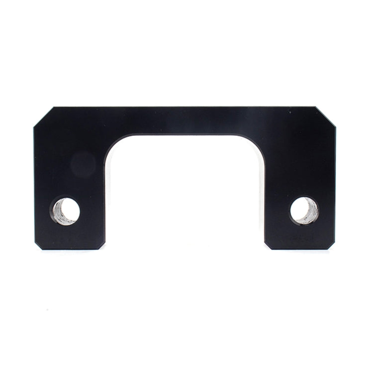Black metal leveling bracket spacer with two round bolt holes and center opening