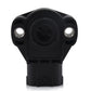 Black throttle position sensor front view with circular center opening and 2 metal posts