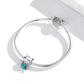 Snake-chain bracelet featuring sterling silver cat mermaid bead charms and turquoise tail