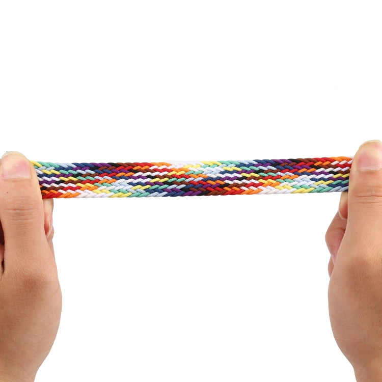Rainbow braided watchband strap held taut, showing multicolor interwoven pattern