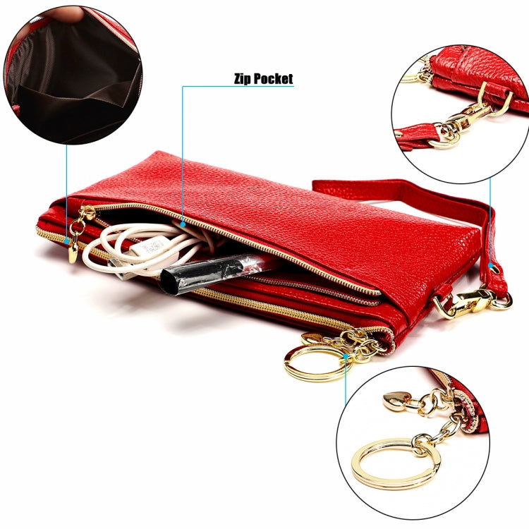 Red zip coin purse key case with gold hardware, keychain rings, and wrist strap.