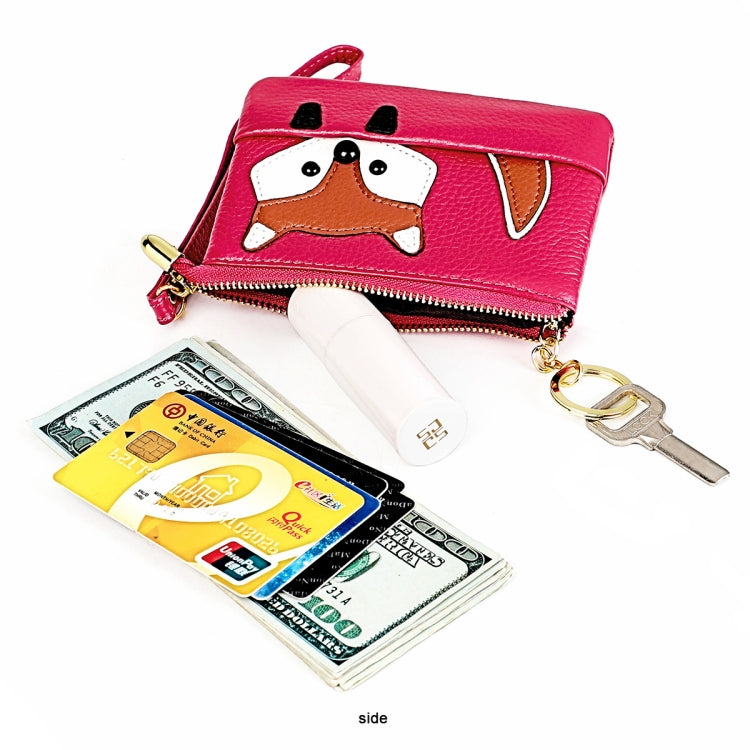 Pink fox key case showing contents in zip compartment and gold zipper detail