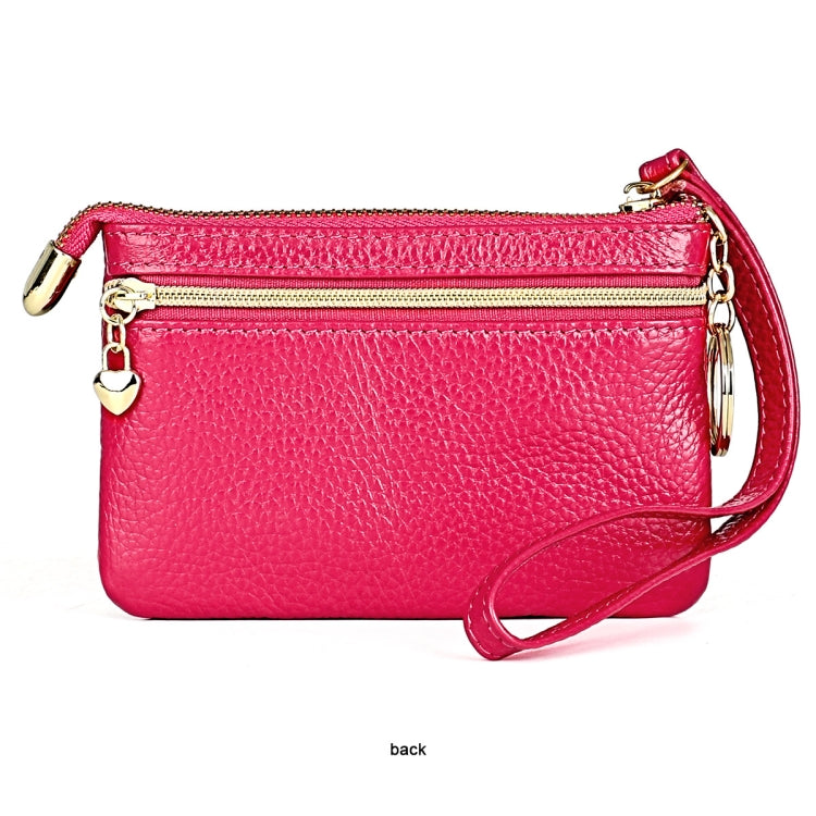 Pink mini leather fox key case back view with gold zipper and wrist strap