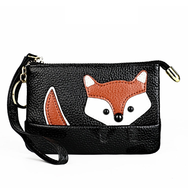 Black mini leather fox key case with gold zipper, crossbody strap, and fox face applique