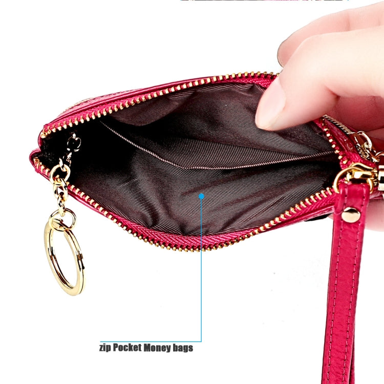 Mini zip key case wallet with red exterior and wrist strap, gold-tone hardware