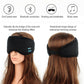 Black Bluetooth sleep eye mask worn on model’s face with control buttons visible