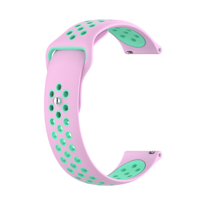 Two-tone silicone watch strap, pink with mint green perforation dots and buckle.